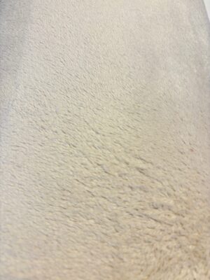 Bézs színű pléd anyag