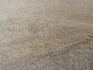 Világos barna színű pléd anyag